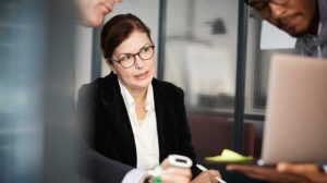 Woman looking at laptop screen