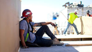 Construction Worker Sitting Down
