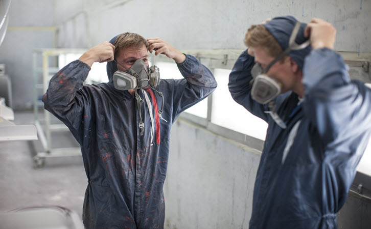 Factory Workers with Gas Masks