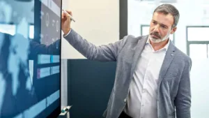 ESG professional at digital screen