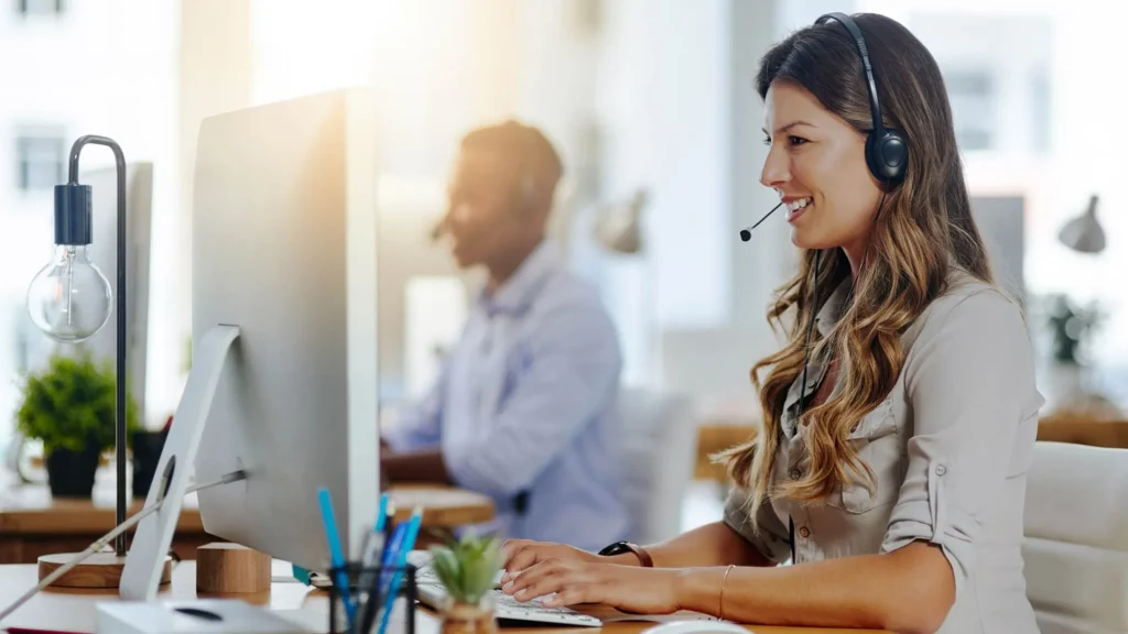 Customer service professional at workstation