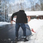 Man shoveling snow