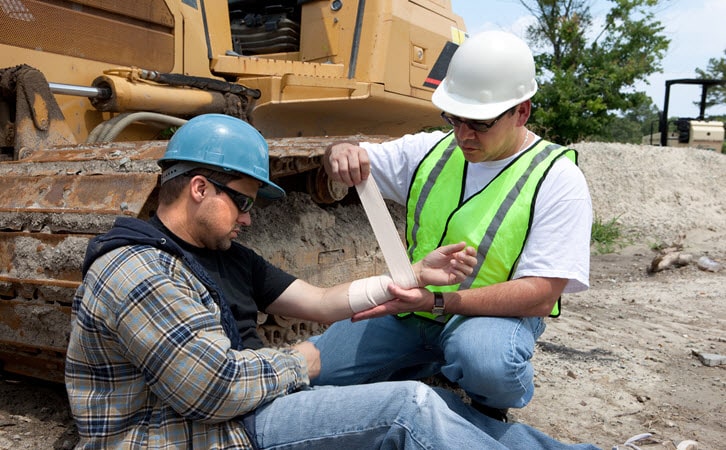 Worker Treating Injury