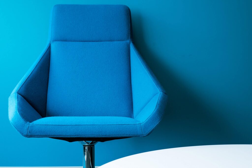 blue office chair and walls