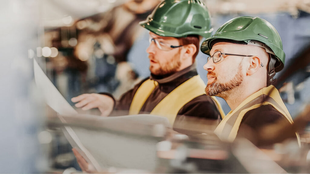 Safety professionals reviewing plans