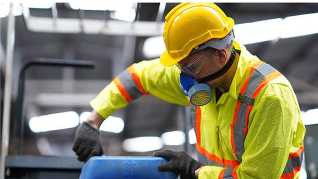 Man Checking Waste Drum