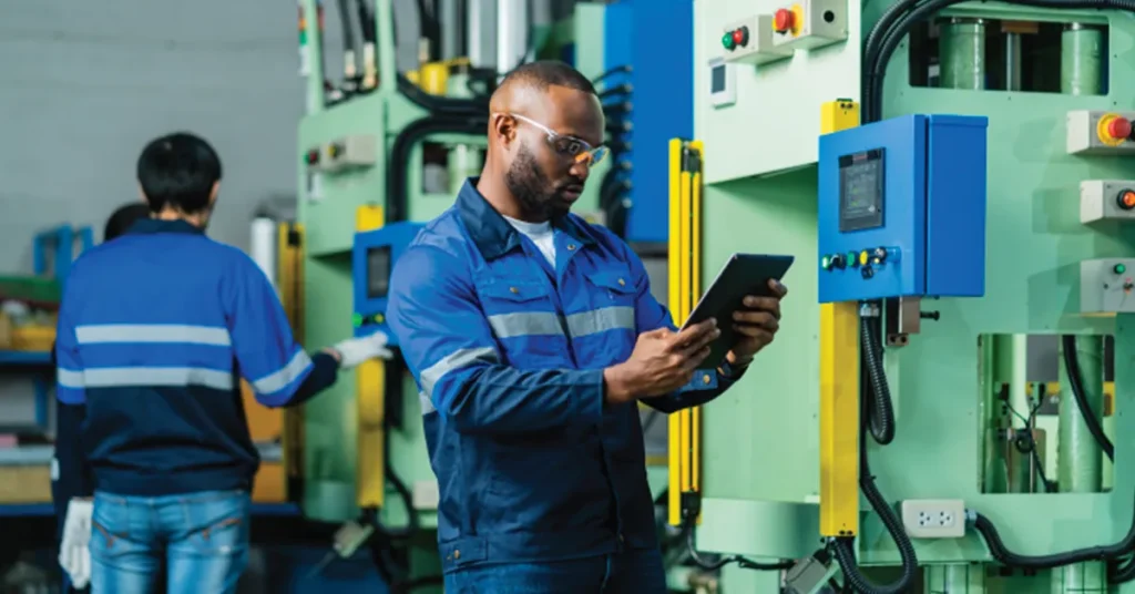 Worker performing Job Safety Analysis (JSA)