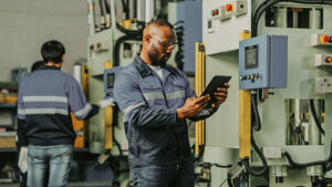 Factory Workers using Contractor Safety software