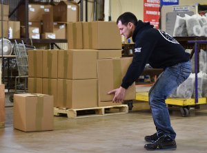 Worker lifting up box