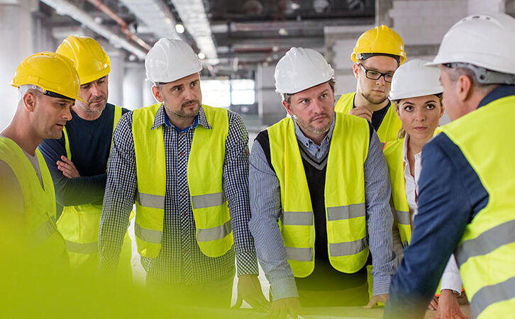 Employees meeting at facility