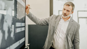 ESG professional at digital screen