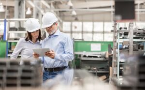 Manufacturing professionals risk assessment at factory