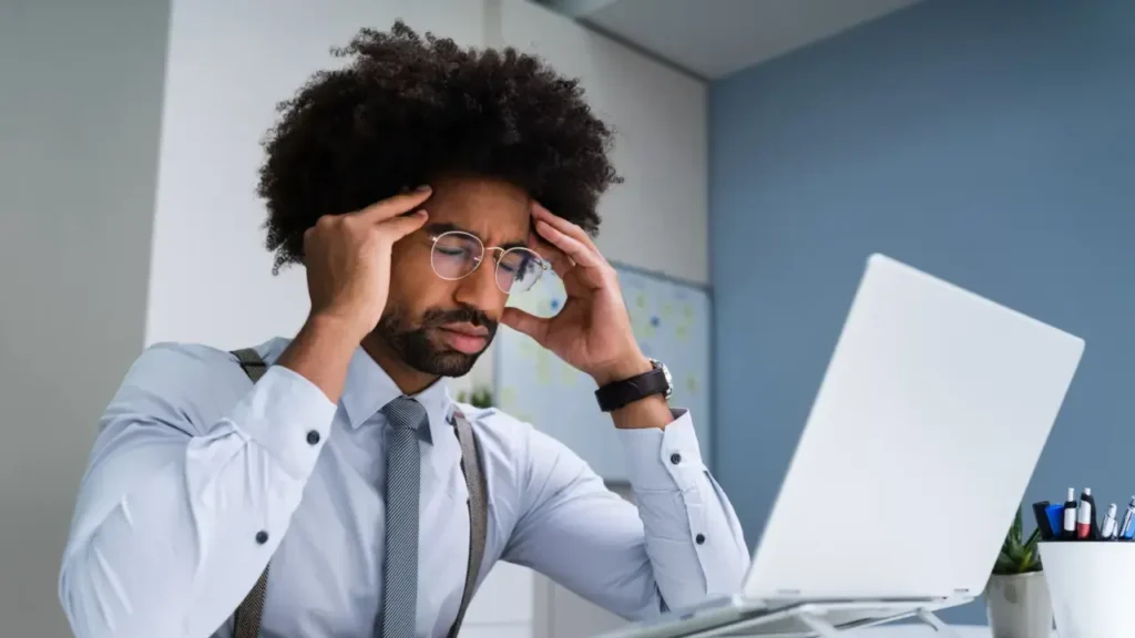 Man Frustrated in Front of Computer