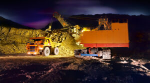 Mining quarry and two machines