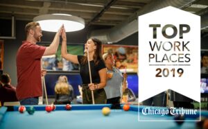 Friends playing pool