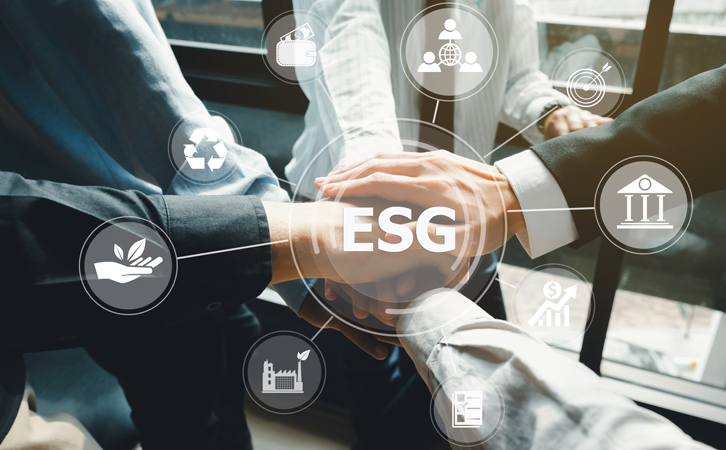 ESG Symbols and Workers Holding Hands