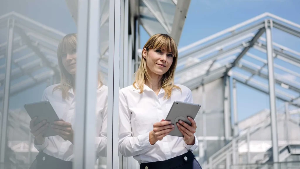 Woman With Tablet Smiling