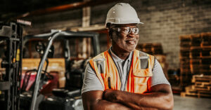 Man Smiling Warehouse 1200x628