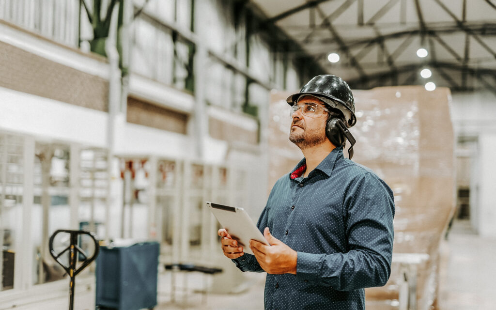 EHS worker using AI on floor