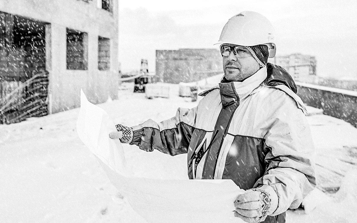 Civil Engineer At Construction Site In Winter