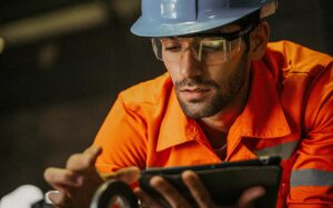 Engineer Using Tablet In Petrochemical Industry.
