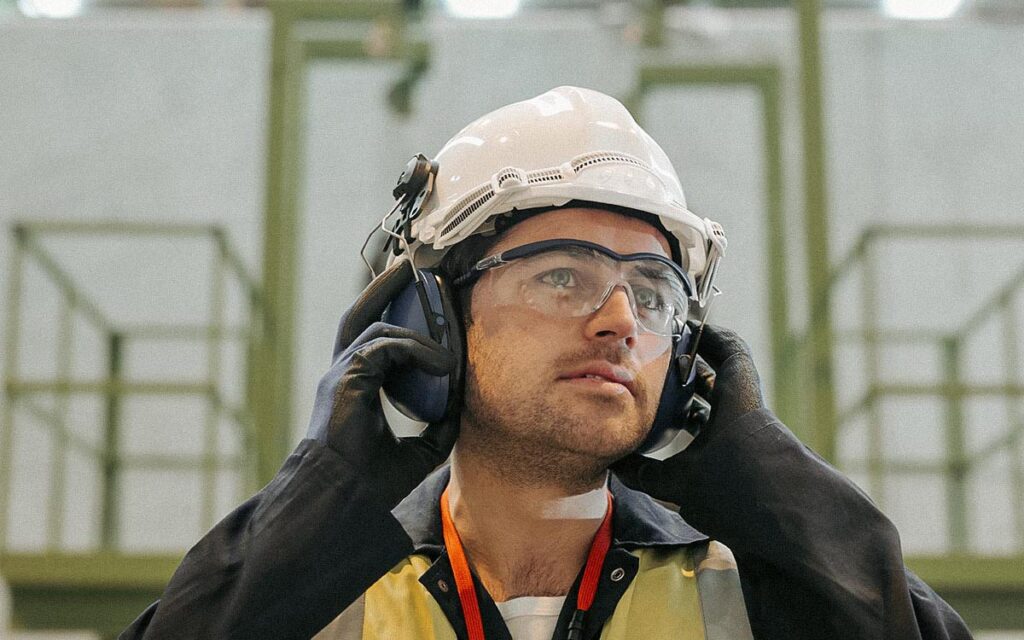 Worker With Protective Clothing