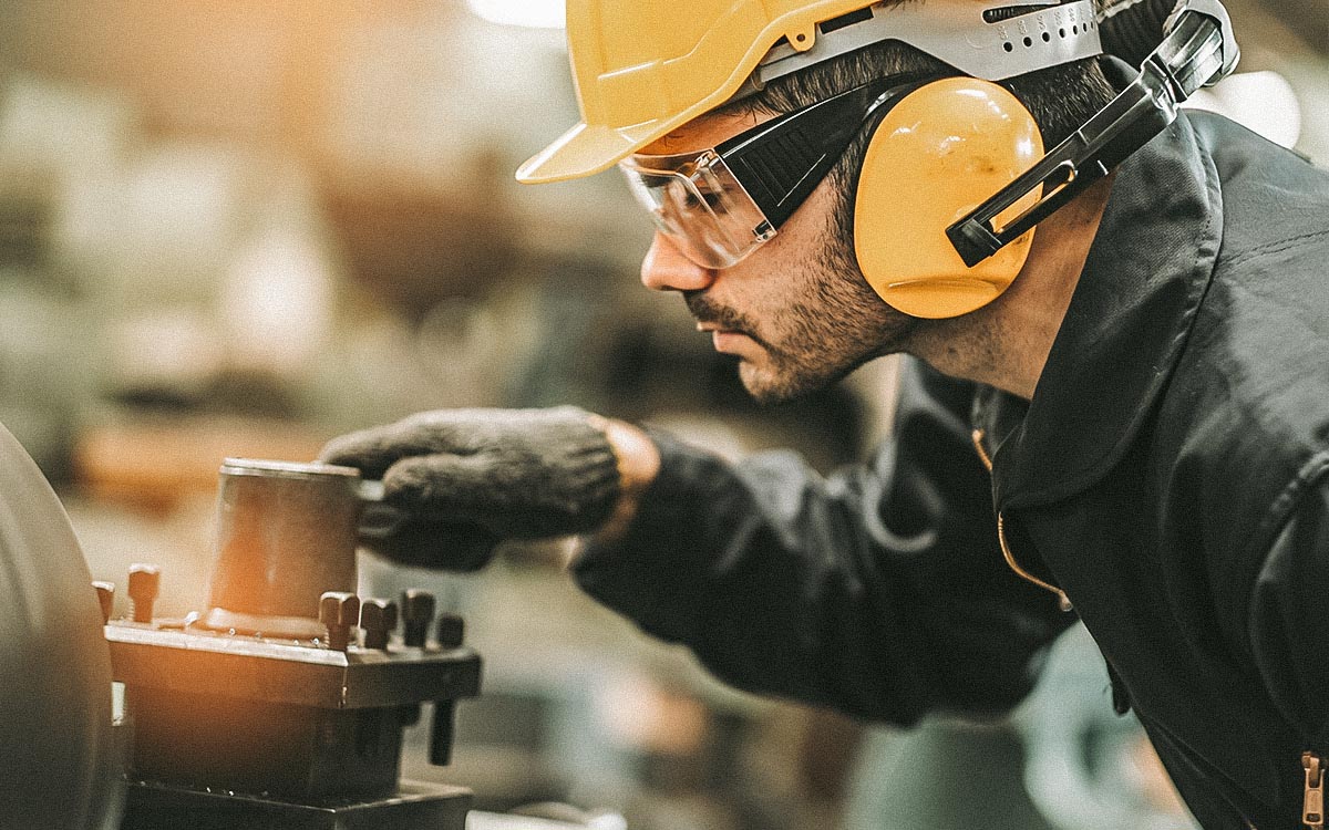 Industrial Engineers In Hard Hats.work At The Heavy Industry Manufacturing Factory.industrial Worker Indoors In Factory. Man Working In An Industrial Factory.safety First Concept.