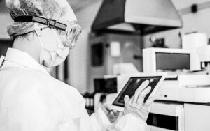 Young Female Scientist Working With Digital Tablet In Laboratory.