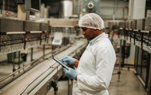 Factory Engineer Using Digital Tablet In The Factory