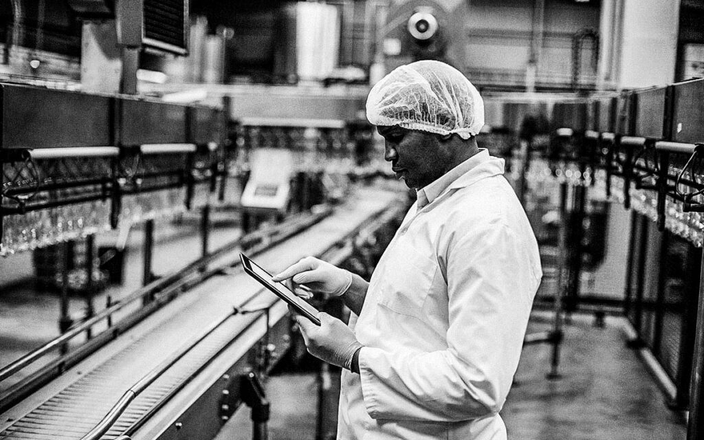 Factory Engineer Using Digital Tablet In The Factory