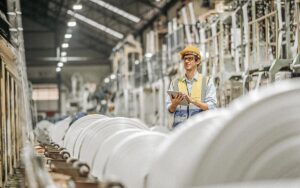 Manufacturers Engineer And Tablet Working At Plastic Bag Manufacturers.