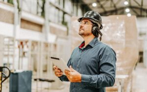 Industrial Manager Inspecting Factory
