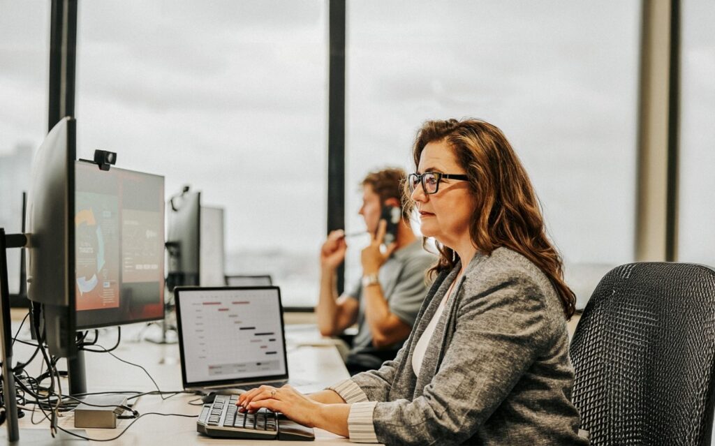 Woman Professional Using Laptop
